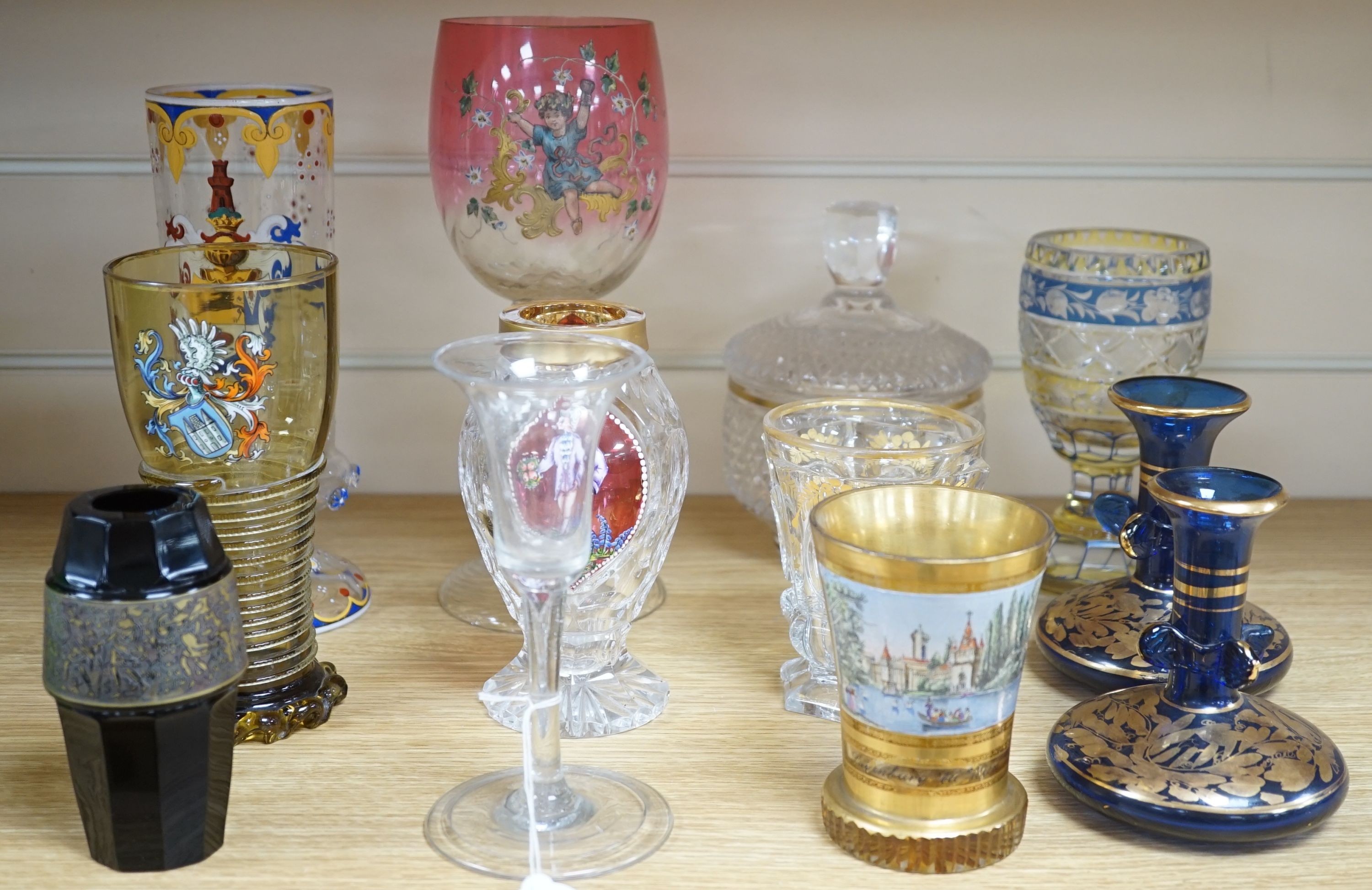 A wheel engraved Bohemian blue and yellow glass goblet, a similar gilded beaker in the manner of Anton Kothgasser, other bohemian cut glass, Moser, an 18th century Dutch soda glass, etc